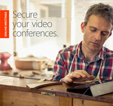 Secure your conferences Man in a workshop looking at a tablet, get the Secure your video conferences eBook by completing form on destination page