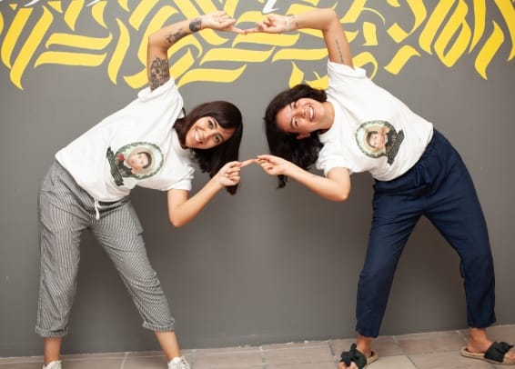 Two people posing